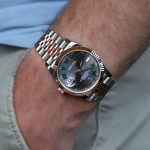 a close up of a person wearing a watch