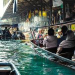 people riding on boat during daytime